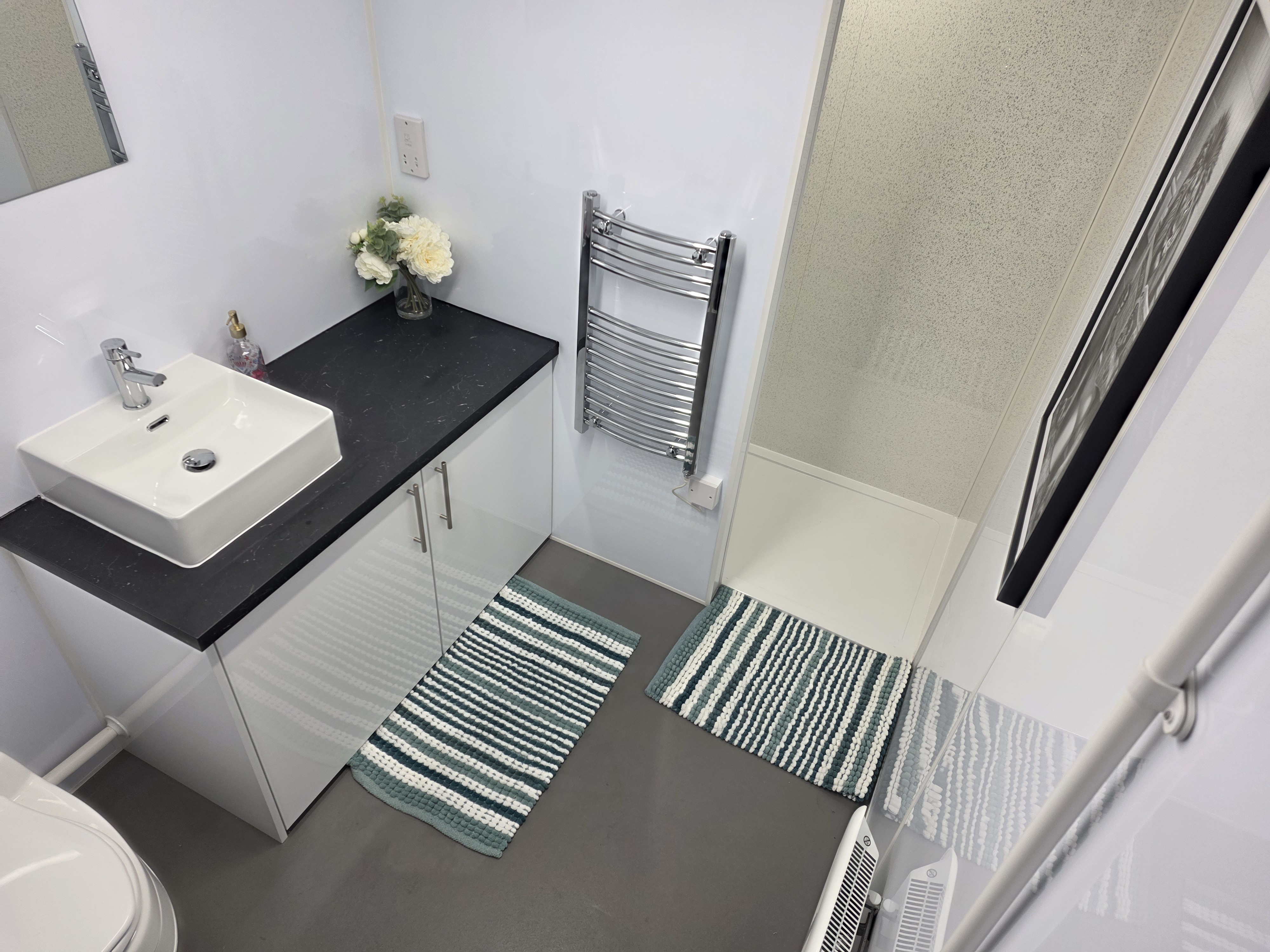 Bathroom pod — heated towel rail and storage
